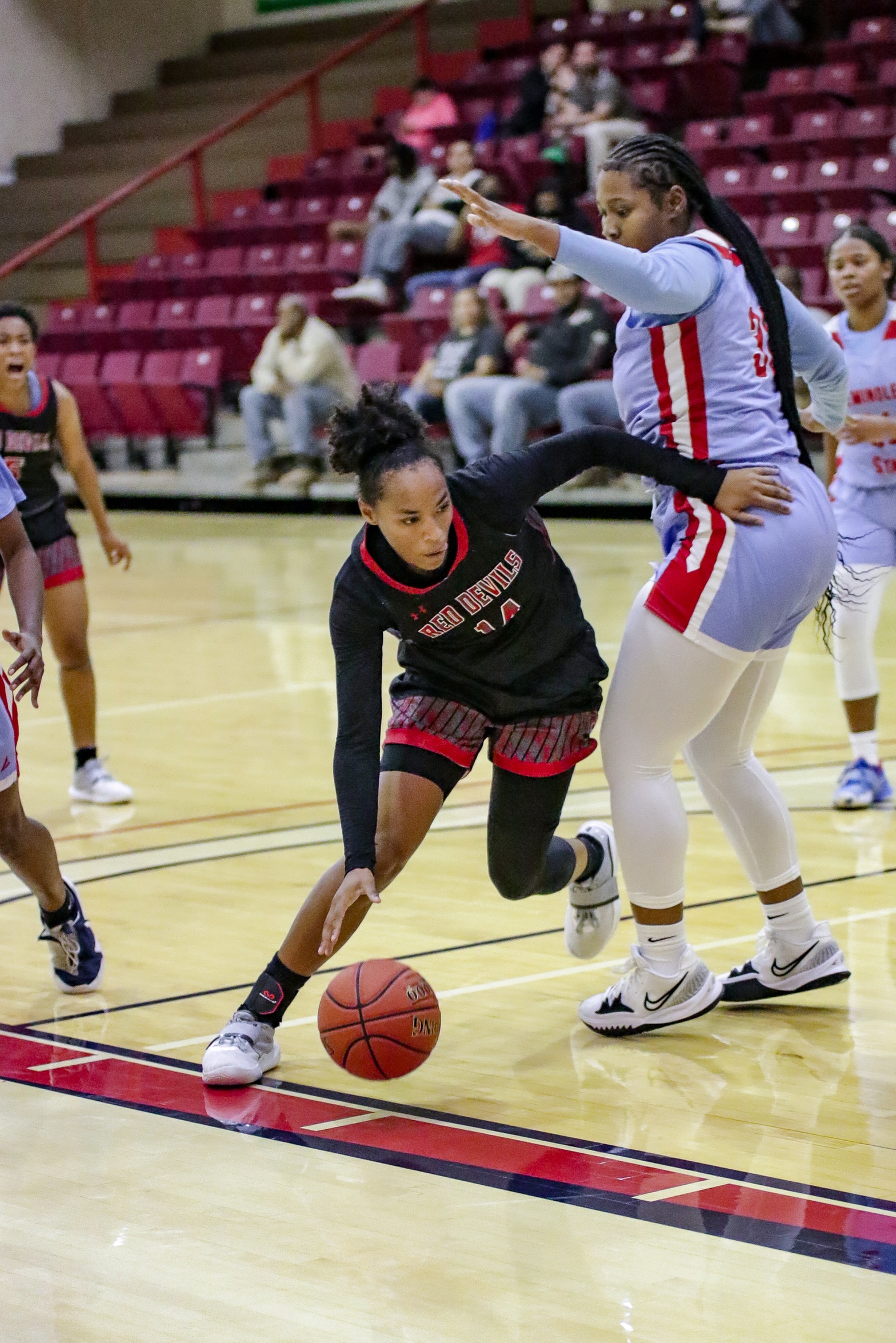 Lady Red Devils Improve to 3-2 in Conference