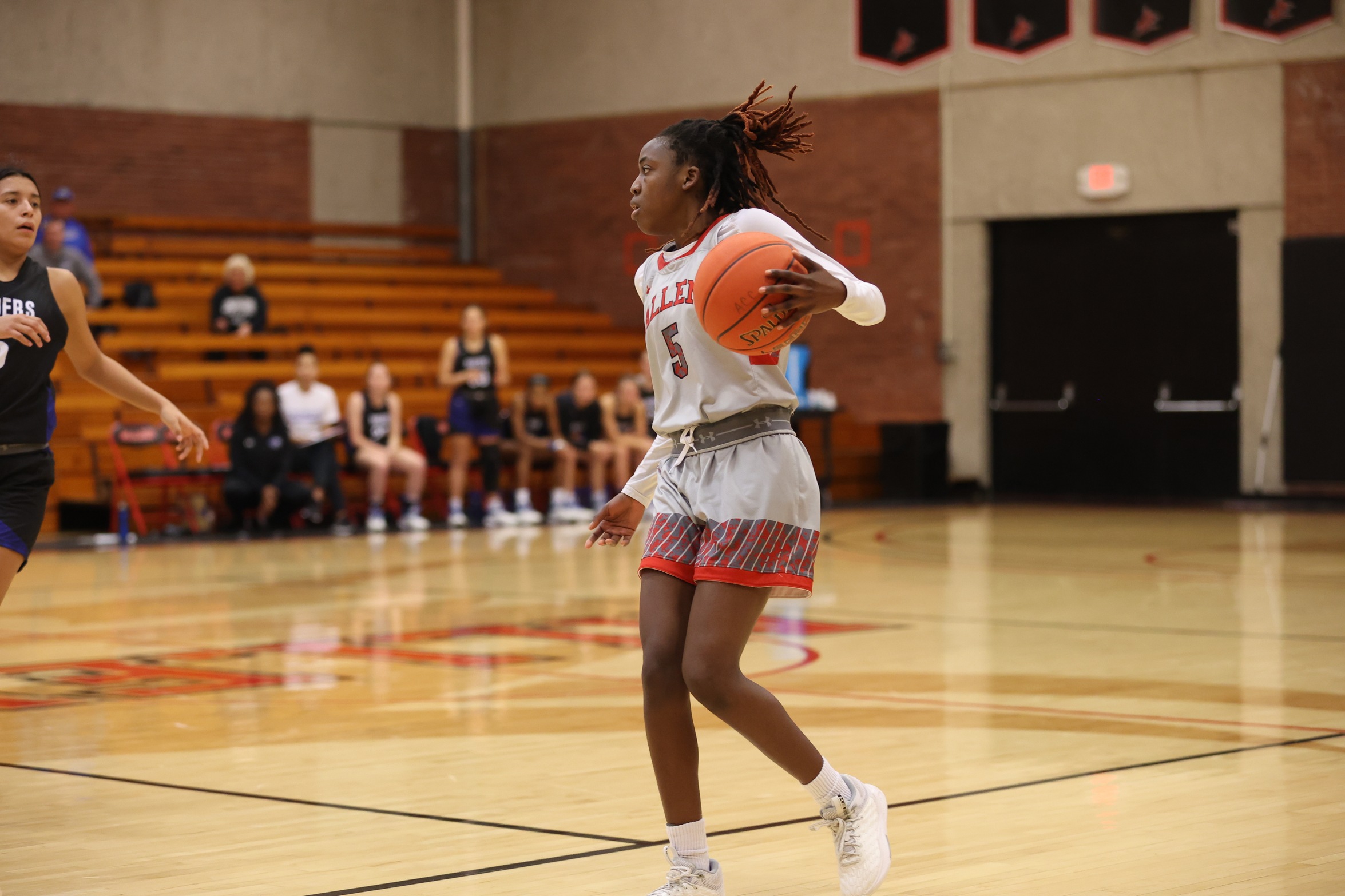 Lady Red Devils Win in OT Over Panthers